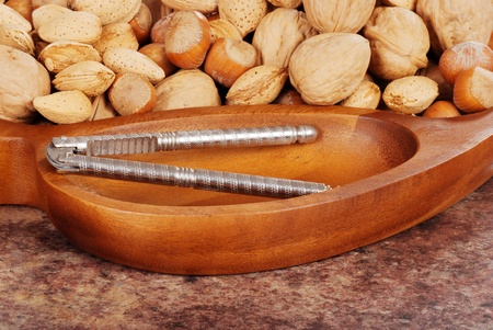 assorted nuts in wood bowlの写真素材
