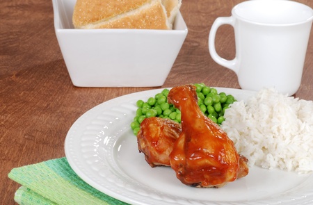 Chicken leg meal with vegetablesの写真素材