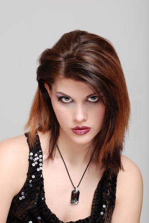 Young woman with necklace portraitの写真素材