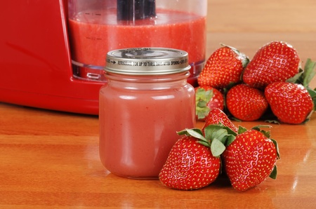 Homemade strawberry baby foodの写真素材
