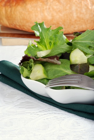 Mixed salad focus on forkの写真素材