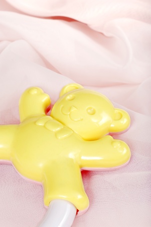 Macro yellow baby rattle toyの写真素材