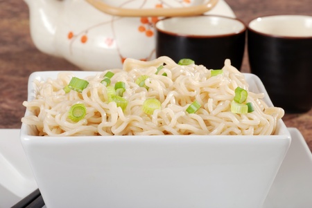 closeup asian noodles with spring onionsの写真素材