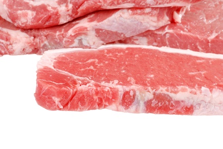 Raw strip loin steaksの写真素材