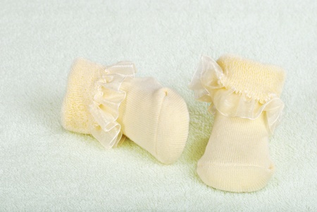 Yellow baby socksの写真素材