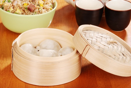 Asian dumpling in bamboo basketの写真素材