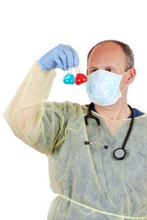Doctor examining two laboratory samplesの写真素材