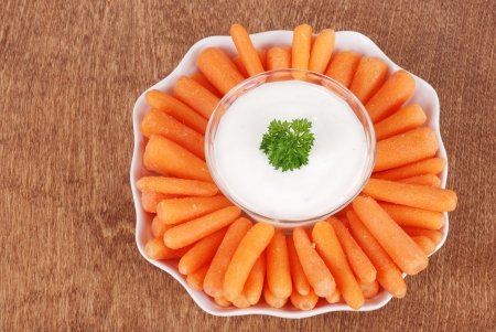 Top view carrots with salad dipの写真素材
