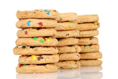 Three stacks of chocolate chip candy cookiesの写真素材