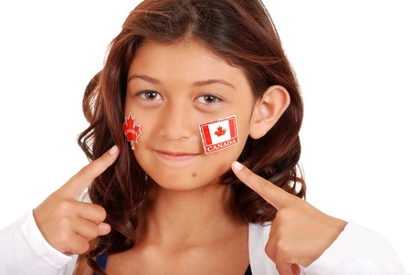 young girl with Canada day stickers on faceの写真素材