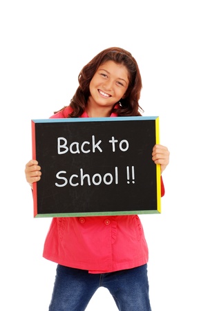Happy school girl with chalk boardの写真素材