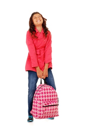 School girl child struggling with heavy backpackの写真素材