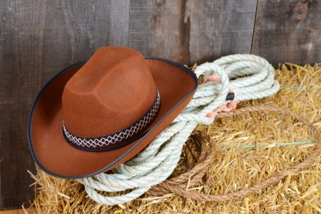 Brown cowboy hat on strawの写真素材