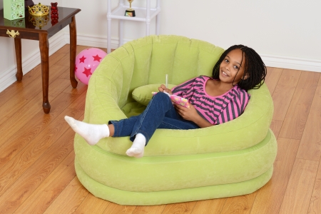 happy young black child relaxingの写真素材