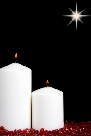 Christmas Candles with red beadsの写真素材