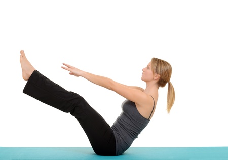 Woman doing Pilates teaser poseの写真素材