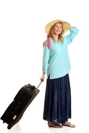 young woman travelling with luggageの写真素材