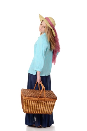 Woman with picnic basketの写真素材