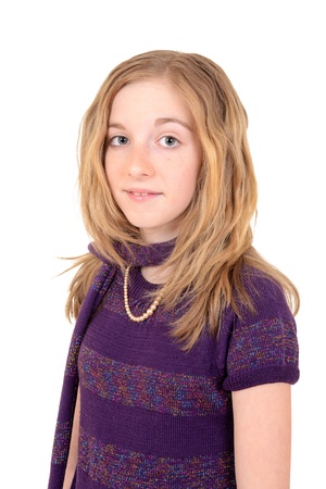 portrait of a child with purple sweater and scarfの写真素材