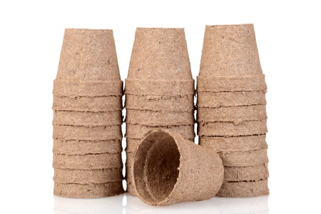 pile of peat pots focus on front one shallow DOFの写真素材