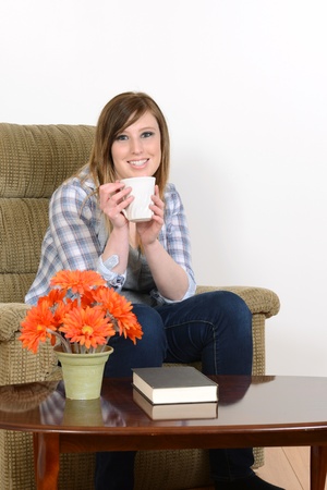 teen girl enjoying a coffeeの写真素材