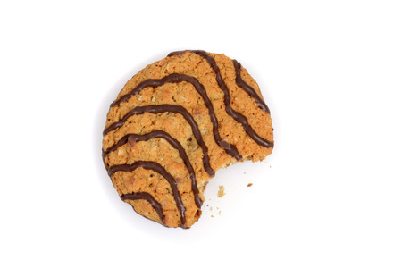 bite from chocolate strip cookieの写真素材