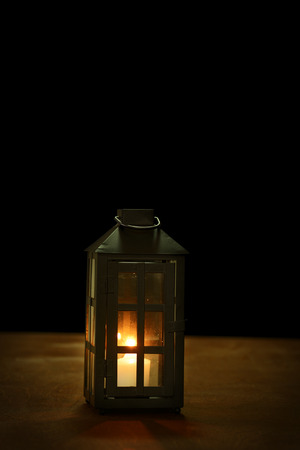 lantern on woodの写真素材
