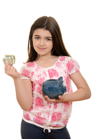 happy child with money and piggy bankの写真素材