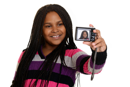 girl child taking selfieの写真素材