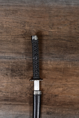samurai sword on woodの写真素材