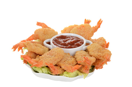 isolated butterfly shrimp with seafood sauce