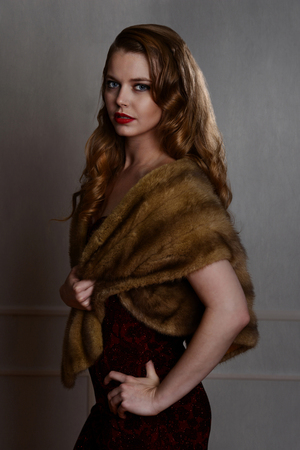 1940s glamour portrait wearing fur wrap