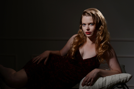1940s glamour portrait on couchの写真素材