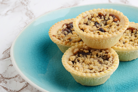 fruit tarts with crumble toppingの写真素材