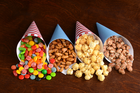 assorted candies in paper conesの写真素材