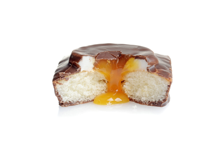 closeup chocolate covered cake with caramel sauceの写真素材