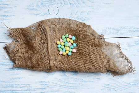 easter eggs in burlap nestの写真素材
