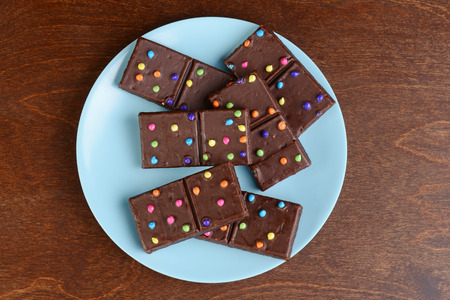 top view chocolate brownies with candy piecesの写真素材