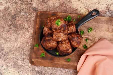 top view meatballs in cast iron skilletの写真素材