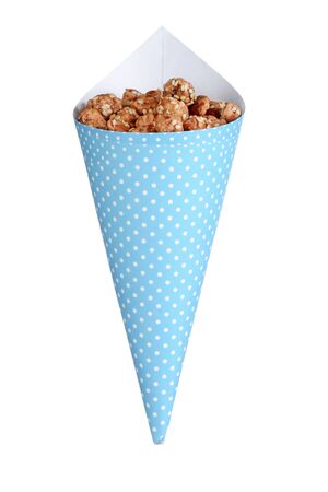 honey sesame seed almonds in a coneの写真素材