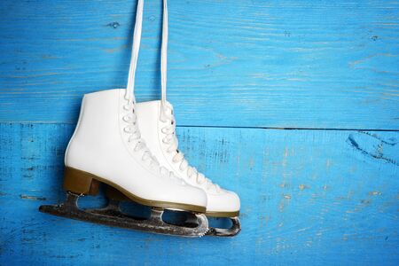 women figure ice skates hangingの写真素材