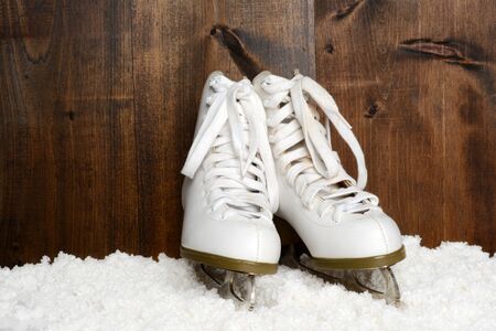 women ice skates in snowの写真素材