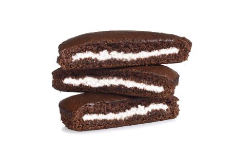 stack of chocolate cream cakes on whiteの写真素材