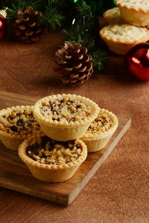 closeup fruit tarts on cutting boardの写真素材