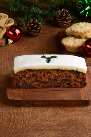 christmas fruit cake with fondant and ornamentsの写真素材