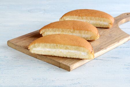 sliced sponge cake with vanilla cream fillingの写真素材