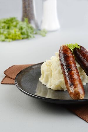 chorizo sausages with mashed potatoの写真素材