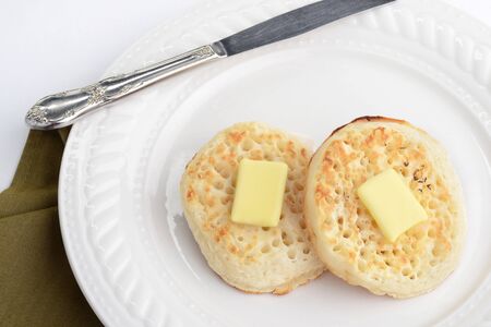 top view english crumpets with butterの写真素材