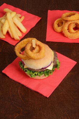 top view of hamburger with onion rings on topの写真素材