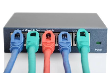 closeup 5 port  network switch with cables